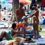 Crowds of people, mostly foreign tourists, sunbath on August 13, 2020, in Crikvenica on the northern Adriatic coast. - On August 13, 180 new cases of coronavirus infection have been recorded in Croatia, the highest since the beginning of the pandemic. Italy has already introduced mandatory testing for all who come from Croatia. (Photo by DENIS LOVROVIC / AFP)