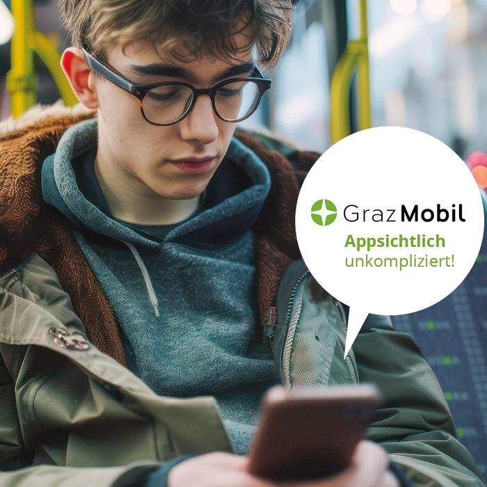 Der junge Mann macht es sich sehr einfach – mit der GrazMobil-App! Die neue Kampagne der Holding Graz rückt die Vorteile der App in den Vordergrund