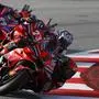 Italian rider Francesco Bagnaia of the Ducati Lenovo Team steers his motorcycle followed by Italian rider Enea Bastianini of the Ducati Lenovo Team and Spain's rider Jorge Martin of the Prima Pramac Racing during the MotoGP sprint race of the Grand Prix of Barcelona at the Catalunya racetrack in Montmelo, just outside of Barcelona, Spain, Saturday, Nov. 16, 2024. (AP Photo/Joan Monfort)