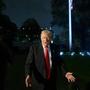 FILE - President Donald Trump talks with reporters upon his arrival at the White House in Washington, Nov. 9, 2025. (AP Photo/Rod Lamkey, Jr., File)