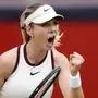 Katie Boulter reacts after winning a point against Diana Shnaider during their match on day four of the HSBC Championships at The Queen's Club, in London, Thursday June 12, 2025. (Jordan Pettitt/PA via AP)