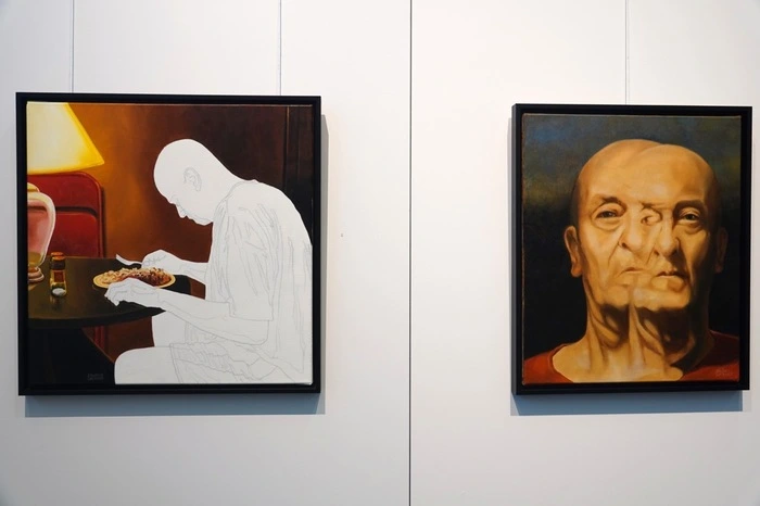 Rechts ein Selbstporträt von Erwin Lackner.