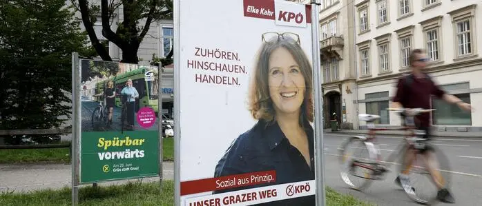 Wahlplakate der Grazer Grünen (links) und KPÖ zur Graz-Wahl am 28. Juni 2026