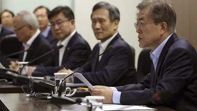 Moon Jae-in (rechts) 