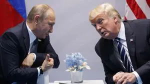 FILE - President Donald Trump, right, meets with Russian President Vladimir Putin at the G-20 Summit in Hamburg, July 7, 2017. (AP Photo/Evan Vucci, File)