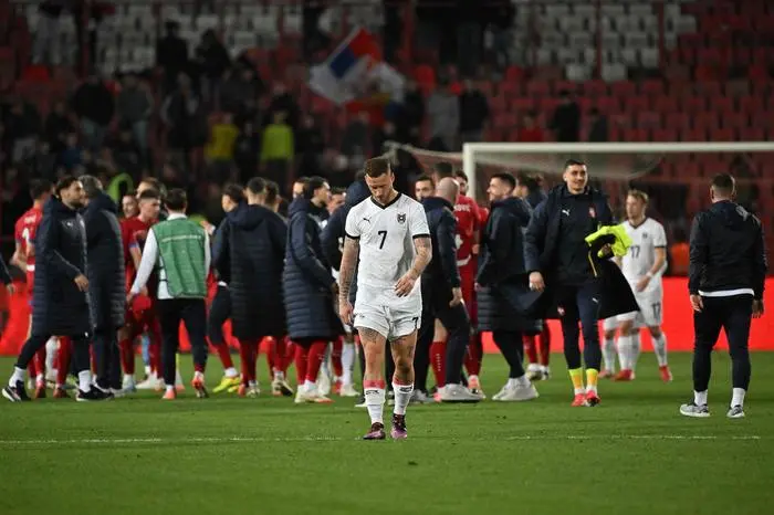 Austria's forward #07 Marko Arnautovic reacts at the end of the UEFA Nations League play-off, second-leg football match between Serbia and Austria at the Rajko Mitic stadium in Belgrade on March 23, 2025. (Photo by Andrej ISAKOVIC / AFP)