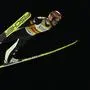 Stefan Kraft, of Austria, soars during the Men's Large Hill Super Team World Cup ski jumping competition, Saturday, Feb. 10, 2024, in Lake Placid, N.Y. (AP Photo/Robert F. Bukaty)