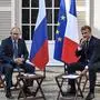 French President Emmanuel Macron (R) meets with Russia's President Vladimir Putin, at his summer retreat of the Bregancon fortress on the Mediterranean coast, near the village of Bormes-les-Mimosas, southern France, on August 19, 2019, for talks days before the G7 Summit . (Photo by GERARD JULIEN / POOL / AFP)