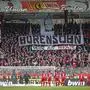 Union fans on the tribune display a banner reading "Son of a bitch" against TSG Hoffenheim club patron Dietmar Hopp during the German Bundesliga soccer match between 1. FC Union Berlin and VfL Wolfsburg, in Berlin, Germany, Sunday, March 1, 2020. (Andreas Gora/dpa via AP)