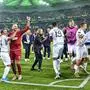 Wolsberg's team celebrates after winning the Europa League Group J soccer match between Borussia Moenchengladbach and Wolfsberger AC in Moenchengladbach, Germany, Thursday Sept. 19, 2019. (AP Photo/Martin Meissner)