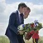 France's Prime Minister Gabriel Attal, left, Britain's Prince William, the Prince of Wales, center, and Canadian Prime Minister Justin Trudeau lay flowers during the Canadian commemorative ceremony marking the 80th anniversary of the World War II D-Day landing, at the Juno Beach Centre near Courseulles-sur-Mer, Normandy, Thursday, June 6, 2024. (Lou Benoist, Pool via AP)