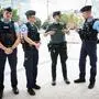 French gendarmes talk to a Spanish guardia civil (2ndR) in Paris, on July 21, 2024, ahead of the Paris 2024 Olympic and Paralympic Games. (Photo by Loic VENANCE / AFP)