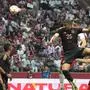 Germany's Malick Thiaw, centre right, in action during the international friendly soccer match between Poland and Germany at the Narodowy stadium in Warsaw, Poland, Friday, June 16, 2023. (AP Photo/Czarek Sokolowski)