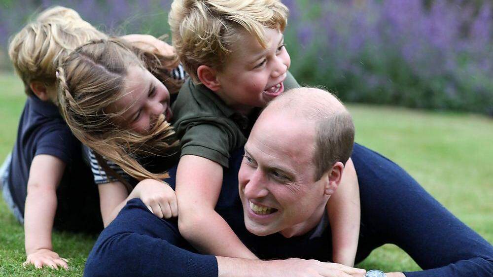 William mit seinen drei Kindern
