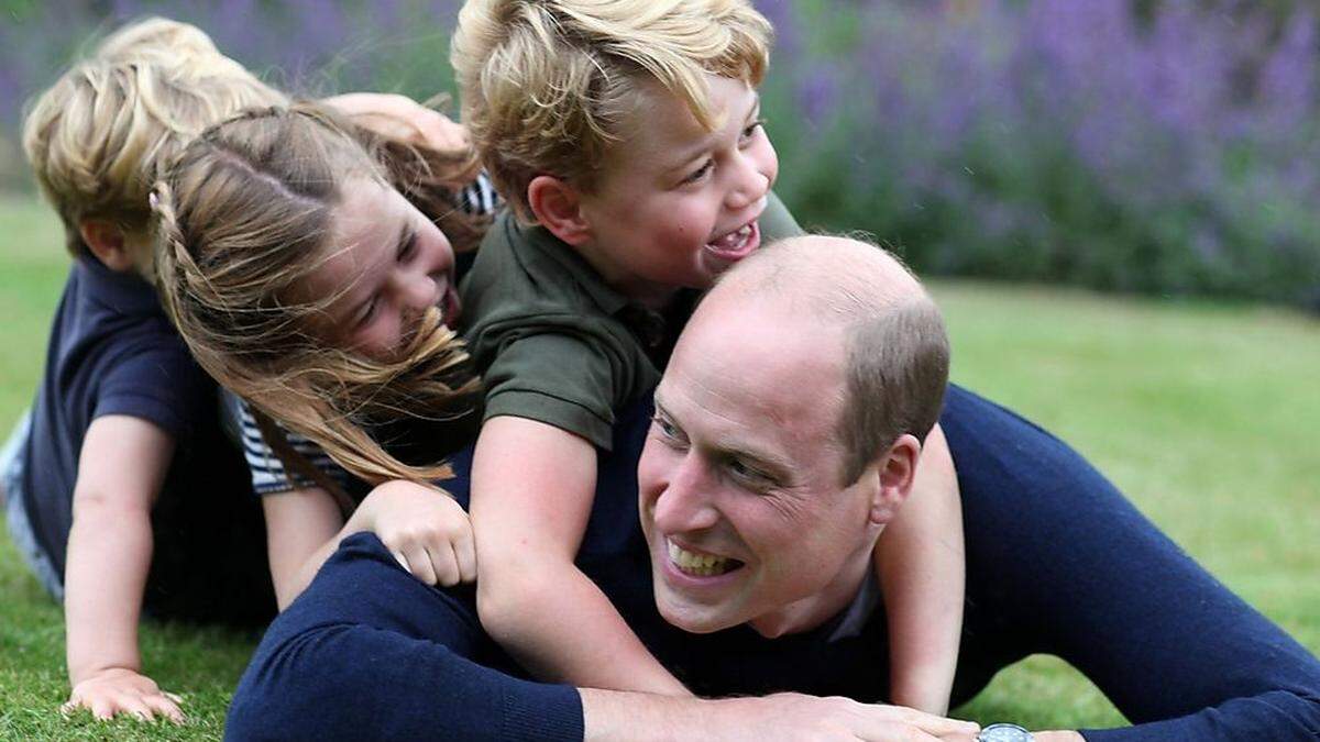 William mit seinen drei Kindern