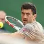 Austria's Sebastian Ofner eyes the ball as he competes against Germany's Alexander Zverev during their Monte Carlo ATP Masters Series Tournament round of 32 tennis match on the Rainier III court at the Monte Carlo Country Club on April 9, 2024. (Photo by Valery HACHE / AFP)