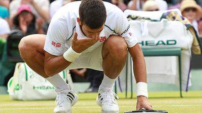 Nach dem Sieg über Anderson küsste Novak Djokovic den Rasen