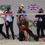 Prince William plays beach volleyball with youths on Copacabana beach in Rio de Janeiro, Monday, Nov. 3, 2025. (AP Photo/Silvia Izquierdo)
