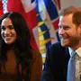Britain's Prince Harry, Duke of Sussex and Meghan, Duchess of Sussex gesture during their visit to Canada House in thanks for the warm Canadian hospitality and support they received during their recent stay in Canada,  in London on January 7, 2020. (Photo by DANIEL LEAL-OLIVAS / various sources / AFP)