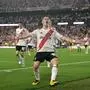 (FILES) River Plate's midfielder #30 Franco Mastantuono celebrates after shooting a penalty and scoring a goal during the Copa Libertadores group stage football match between Argentina's River Plate and Ecuador's Independiente del Valle at the Mas Monumental stadium in Buenos Aires, on May 15, 2025. Real Madrid have agreed a deal to sign teenage playmaker Franco Mastantuono from River Plate, the Spanish giants announced on June 13, 2025. The 17-year-old attacking midfielder cost Madrid just over 63 million euros ($72 million), according to a statement by River Plate. (Photo by JUAN MABROMATA / AFP)