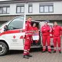Der stellvertretende Bezirksrettungskommandant Daniel Putz (Mitte) mit Mitarbeitern und Zivildienern 