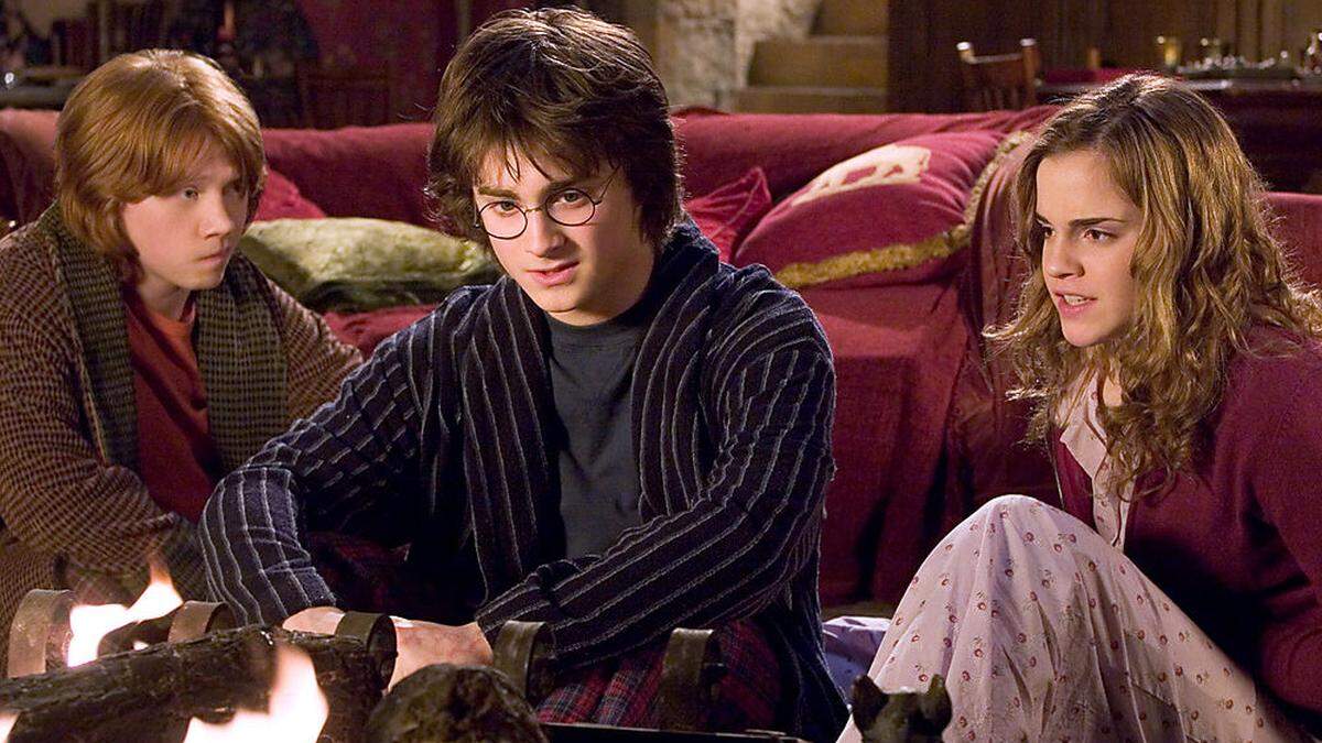 Rupert Grint als Ron Weasley, Daniel Radcliff als Harry Potter und Emma Watson as Hermine Granger
