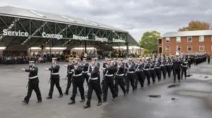 In this photo provided by the Australian Defense Force, recruits march on to the parade ground during their graduation ceremony on April 26, 2024, at the Royal Australian Navy Recruit School at HMAS Cerberus, in Melbourne, Australia. Australian Deputy Prime Minister Richard Marles said Tuesday, June 4, 2024, that  he wants to build a defense force that can resist foreign coercion through blocked trade routes as Australia relaxes recruitment rules in a bid to boost troop numbers. (LSIS Sittichai Sakonpoonpol/Australian Defense Force via AP)