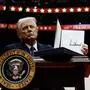 WASHINGTON, DC - JANUARY 20: U.S. President Donald Trump holds up an executive order after signing it during an indoor inauguration parade at Capital One Arena on January 20, 2025 in Washington, DC. Donald Trump takes office for his second term as the 47th president of the United States. Copyright: x.x