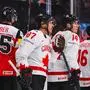 Canada’s forward #87 Sidney Crosby celebrates with his teammates after scoring 5-1 during the IIHF Men's Ice hockey World Championship match between Canada and Austria in Stockholm, on May 15, 2025. (Photo by Jonathan NACKSTRAND / AFP)