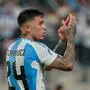 (FILES) Argentina's midfielder #24 Enzo Fernandez celebrates his team's victory during the Conmebol 2024 Copa America tournament semi-final football match between Argentina and Canada at MetLife Stadium, in East Rutherford, New Jersey on July 9, 2024. Chelsea Football Club launched “disciplinary proceedings” against Argentine midfielder Enzo Fernandez on July 17, 2024, following a racist song directed at players from the French national soccer team. (Photo by EDUARDO MUNOZ / AFP)