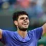 Spain's Carlos Alcaraz celebrates his victory at the end of his men's singles final match against Italy's Jannik Sinner for the ATP Rome Open tennis tournament at Foro Italico in Rome on May 18, 2025. (Photo by Tiziana FABI / AFP)