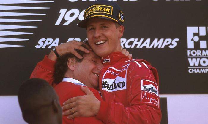 Spa-Francorchamps, Belgium. 23-25 August 1996. Michael Schumacher (Ferrari) 1st position celebrates on the podium with