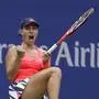 Angelique Kerber, of Germany, reacts after winning a game against Karolina Pliskova, of the Czech Republic, during the women's singles final of the U.S. Open tennis tournament, Saturday, Sept. 10, 2016, in New York. (AP Photo/Julio Cortez)