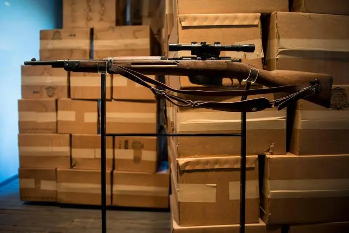 (FILES) A Carcano Model 91/38 rifle, as it was used by Lee Harvey Oswald to kill US President John F Kennedy, is seen at a museum which formerly housed the Texas School Book Depository on October 8, 2013 in Dallas, Texas. US Donald Trump said his administration will release on March 18, 2025, the remaining government files on the assassination of president John F. Kennedy -- a case that still fuels conspiracy theories more than 60 years after his death. The Warren Commission that investigated the shooting of the charismatic 46-year-old president determined that it was carried out by a former Marine sharpshooter, Lee Harvey Oswald, acting alone. But that formal conclusion has done little to quell speculation that a more sinister plot was behind Kennedy's murder in Dallas, Texas, and the slow release of the government files has added fuel to various conspiracy theories. (Photo by Brendan SMIALOWSKI / AFP)