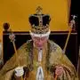 (FILES) Britain's King Charles III wears the St Edward's Crown on his head during the Coronation Ceremony inside Westminster Abbey in central London on May 6, 2023. Britain's Charles III reaches the milestone of his first year as king this week, with his reign so far characterised by a smooth transition from that of his late mother, Queen Elizabeth II. (Photo by Andrew Matthews / POOL / AFP)