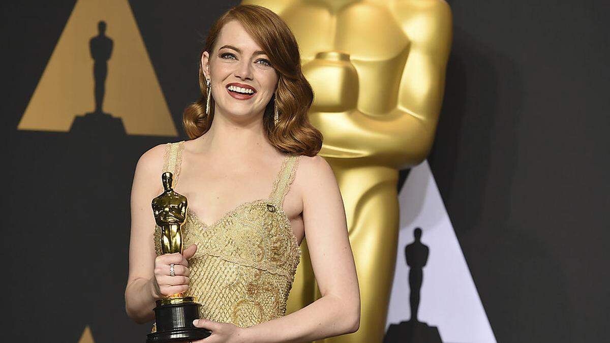 Passend zum Preis in golder Robe: Oscarpreisträgerin Emma Stone