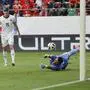 ABD0088_20240608 - ST. GALLEN - SCHWEIZ: Switzerland's Silvan Widmer, left, scores his side's first goal against Austria's goalkeeper Heinz Lindner, Austria's Philipp Lienhart and Austria's Philipp Mwene, from right, during an international friendly soccer match between Switzerland and Austria at the kybunpark stadium in St. Gallen, Switzerland, Saturday, June 8, 2024. (KEYSTONE/Peter Klaunzer). - FOTO: APA/KEYSTONE/PETER KLAUNZER