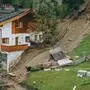 Ein von einem Erdrutsch betroffenes Haus am Schaufelberg