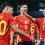 TOPSHOT - Spain's midfielder #08 Fabian Ruiz celebrates with teammates after scoring his team's second goal during the UEFA Euro 2024 round of 16 football match between Spain and Georgia at the Cologne Stadium in Cologne on June 30, 2024. (Photo by Alberto PIZZOLI / AFP)
