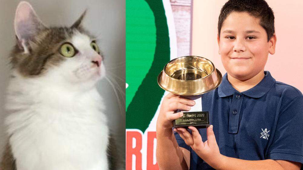 Tierischer Held: Elias Bildik holt den Golden Fressnapf für seine Lebensretter-Katze Sina (links) ab