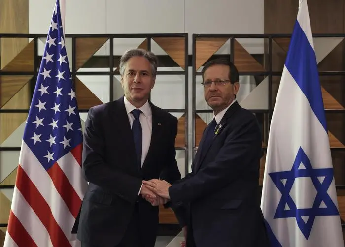 U.S. Secretary of State Antony Blinken, left, meets with Israel's President Isaac Herzog, in Tel Aviv, Israel, Monday, Aug. 19, 2024. (Kevin Mohatt/Pool/Pool Photo via AP)