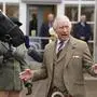 King Charles III attends a reception to thank the community of Aberdeenshire for their organisation and support following the death of Queen Elizabeth II at Station Square, the Victoria & Albert Halls, Ballater, United Kingdom, Tuesday Oct. 11, 2022. (Andrew Milligan/pool photo via AP)