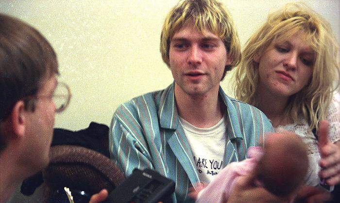 Kurt Cobain and Courtney Love mit Töchterchen Frances