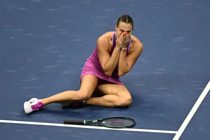 TOPSHOT - Belarus's Aryna Sabalenka reacts after defeating USA's Jessica Pegula during their women's final match on day thirteen of the US Open tennis tournament at the USTA Billie Jean King National Tennis Center in New York City, on September 7, 2024. (Photo by ANGELA WEISS / AFP)