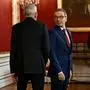Austria's President Alexander van der Bellen (L) welcomes the leader of the far-right Freedom party (FPOe) Herbert Kickl (C) for talks on January 6, 2025 at the presidential Hofburg Palace in Vienna, Austria. Austria's conservatives of the People's Party (OeVP) said on January 5, 2025 they were ready to start negotiations with the far-right Freedom party (FPOe) to form a new government, a policy U-turn after coalition talks with two centrist parties failed. (Photo by Joe Klamar / AFP)