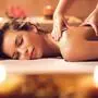 Beautiful woman receiving back massage at the spa.