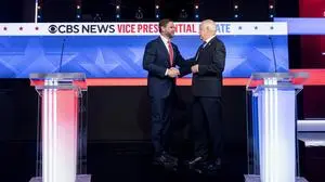 Senator JD Vance, a Republican from Ohio and Republican vice-presidential nominee, left, and Tim Walz, governor of Minnesota and Democratic vice-presidential nominee, during the first vice presidential debate at the CBS Broadcast Center in New York, US, on Tuesday, Oct. 1, 2024. PUBLICATIONxINxGERxSUIxAUTxHUNxONLY nyp20241001104 AlxDrago