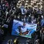 Iranian mourners gather during the final stage of funeral processions for slain top general Qasem Soleimani, in his hometown Kerman on January 7, 2020. - Soleimani was killed outside Baghdad airport on January 3 in a drone strike ordered by US President Donald Trump, ratcheting up tensions with arch-enemy Iran which has vowed "severe revenge". The assassination of the 62-year-old heightened international concern about a new war in the volatile, oil-rich Middle East and rattled financial markets. (Photo by ATTA KENARE / AFP)