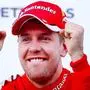epa04684936 German Formula One driver Sebastian Vettel of Scuderia Ferrari celebrates on the podium after winning the 2015 Formula One Grand Prix of Malaysia in Sepang  Malaysia, 29 March 2015.  EPA/DIEGO AZUBEL