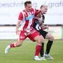 LEBRING,AUSTRIA,12.JUL.25 - SOCCER - ADMIRAL Bundesliga, Landesliga Steiermark, Grazer AK 1902 vs SV Lebring, test match. Image shows Michael Lang  (GAK) and Lukas Andreas Robier (Lebring).
Photo: GEPA pictures/ James Doak